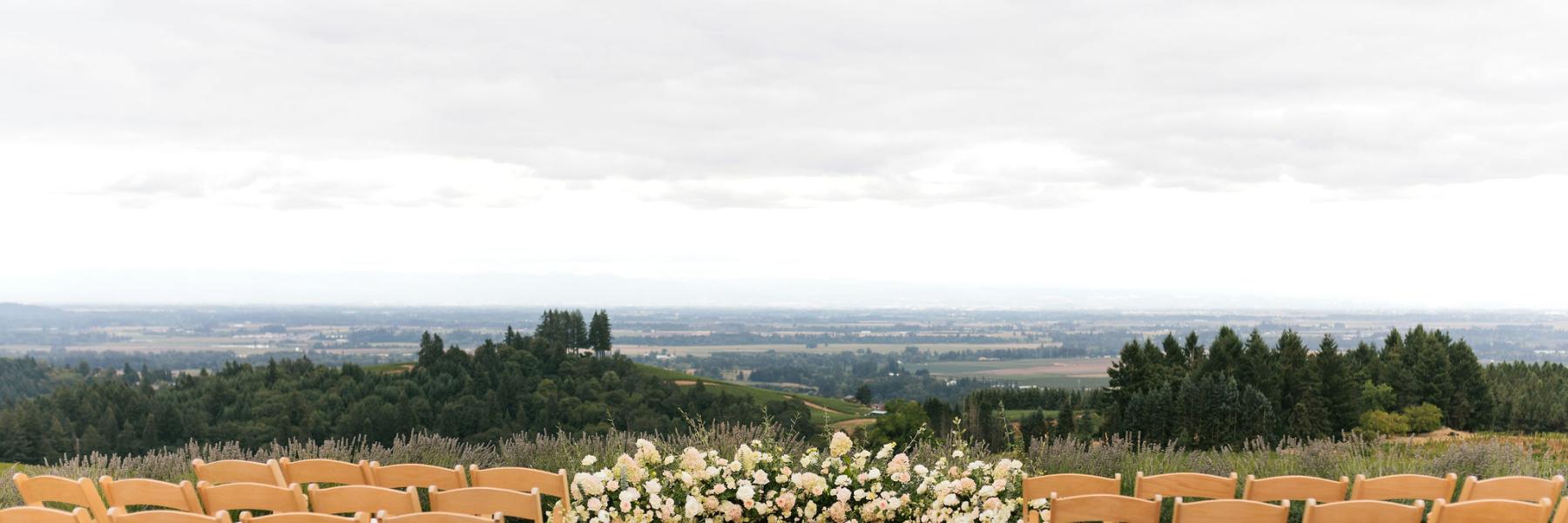 floral aisle decor and ceremony backdrop at Black Walnut Inn