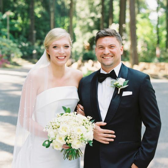 bride and groom smiling