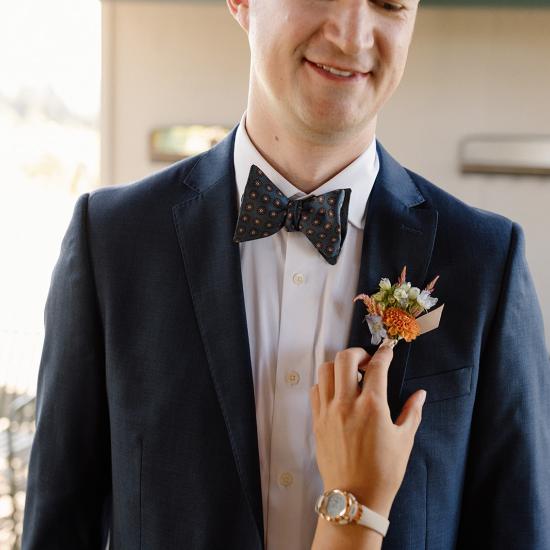 ross with boutonniere