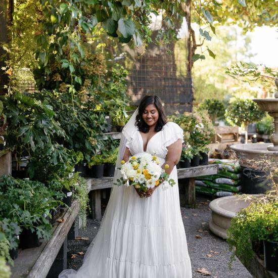 Nishi holding bouquet